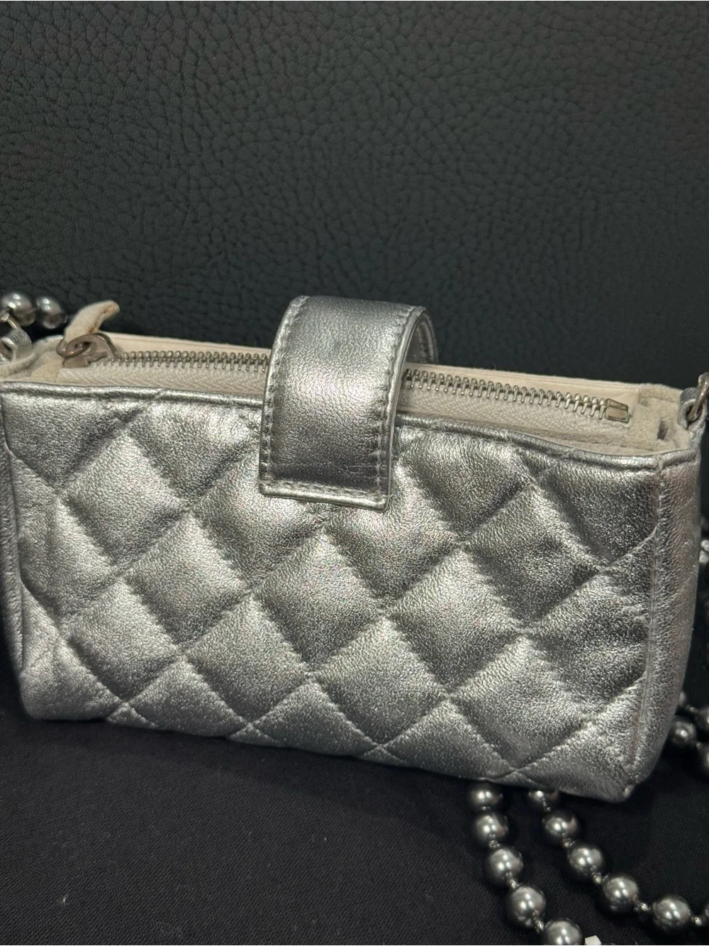 CHANEL Silver Quilted Leather O-Phone Holder with Pearl Chain.